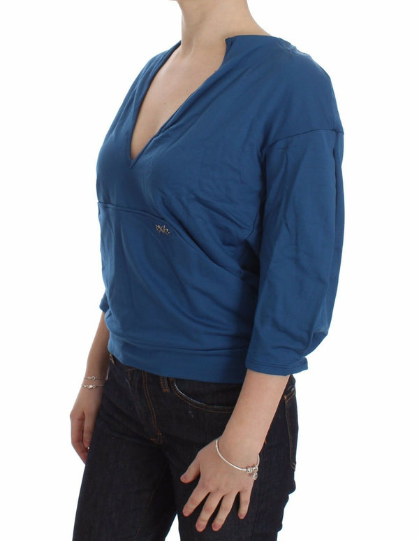 سترة نسائية من القطن الأزرق من Exte بفتحة رقبة على شكل حرف V عميقة