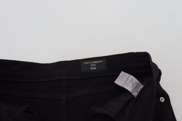 بنطلون جينز قطني ممزق من دولتشي آند غابانا باللون الأسود بقصّة "Slim Fit"