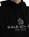 سويت شيرت بغطاء رأس وشعار من Balenciaga باللون الأسود من القطن