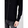 Close-up of Jack Jones Black Polyester Hoody showing front pocket and zip detail, crafted for comfort and practicality.
