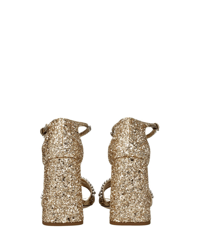 Miu Miu Gold Plastic Platforms