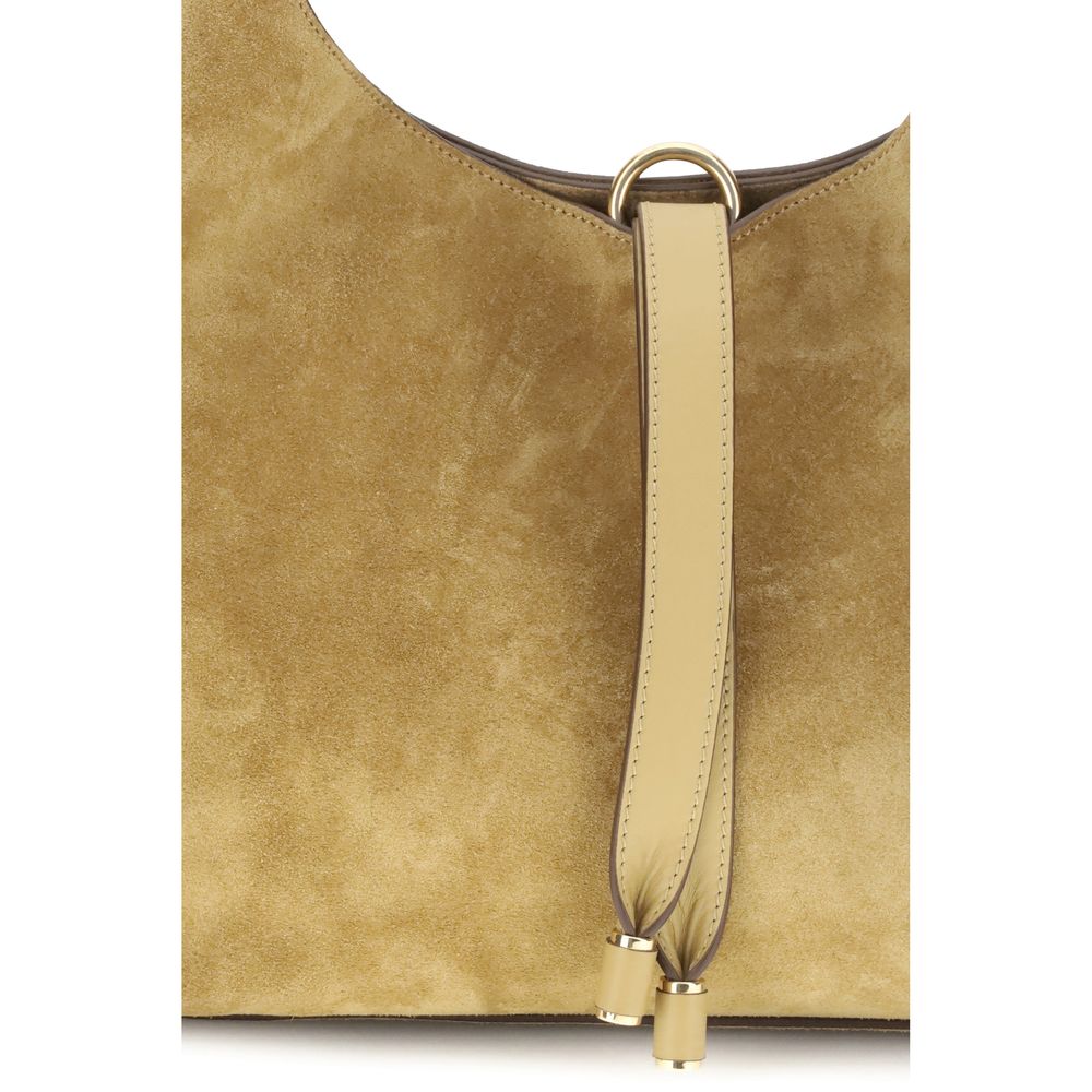 Close-up of Chloé Marcie Shoulder Bag front detailing with leather drawstring accent and gold hardware, emphasizing luxury finish.