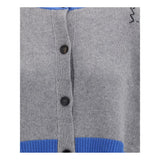 Close-up of Marni Cropped Cardigan front buttons and gray knit texture with blue ribbed trim. Premium women's fashion sweater detail.