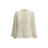 Chloé Silk georgette and lace blouse in cream with intricate lace panels and flared sleeves, ideal for elegant women's fashion collections.