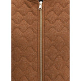 Close-up of Fabiana Filippi Wool Down Vest zipper and textured wool fabric, highlighting premium stitching and wave-quilted detail.