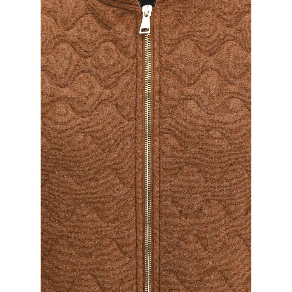 Close-up of Fabiana Filippi Wool Down Vest zipper and textured wool fabric, highlighting premium stitching and wave-quilted detail.