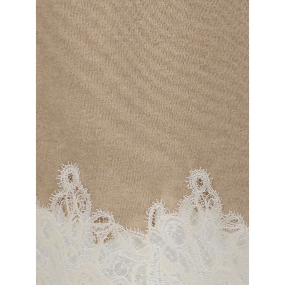 Close-up of Fabiana Filippi Wool and lace Midi Skirt highlighting intricate white lace detailing on beige wool fabric. Premium texture and craftsmanship.