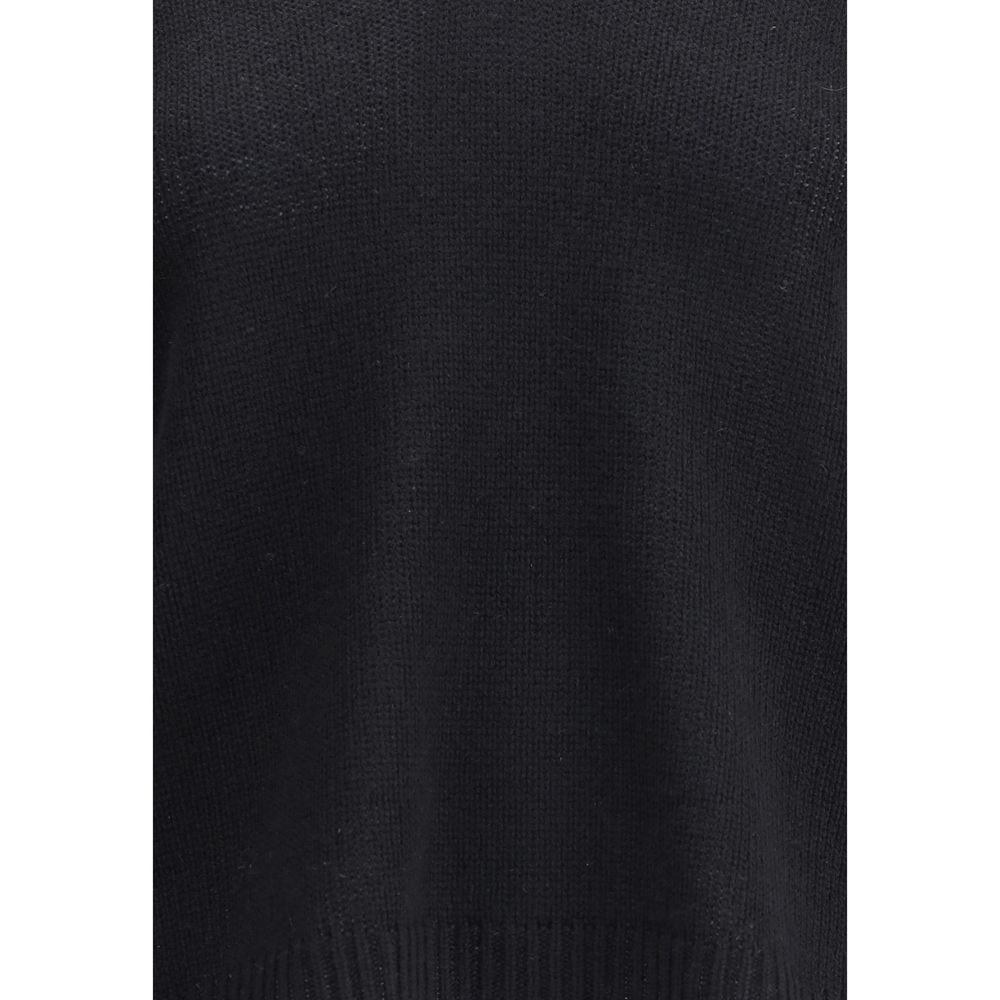 Close-up texture of Fabiana Filippi Cashmere Sweater in black, highlighting premium knit quality and soft cashmere fabric.