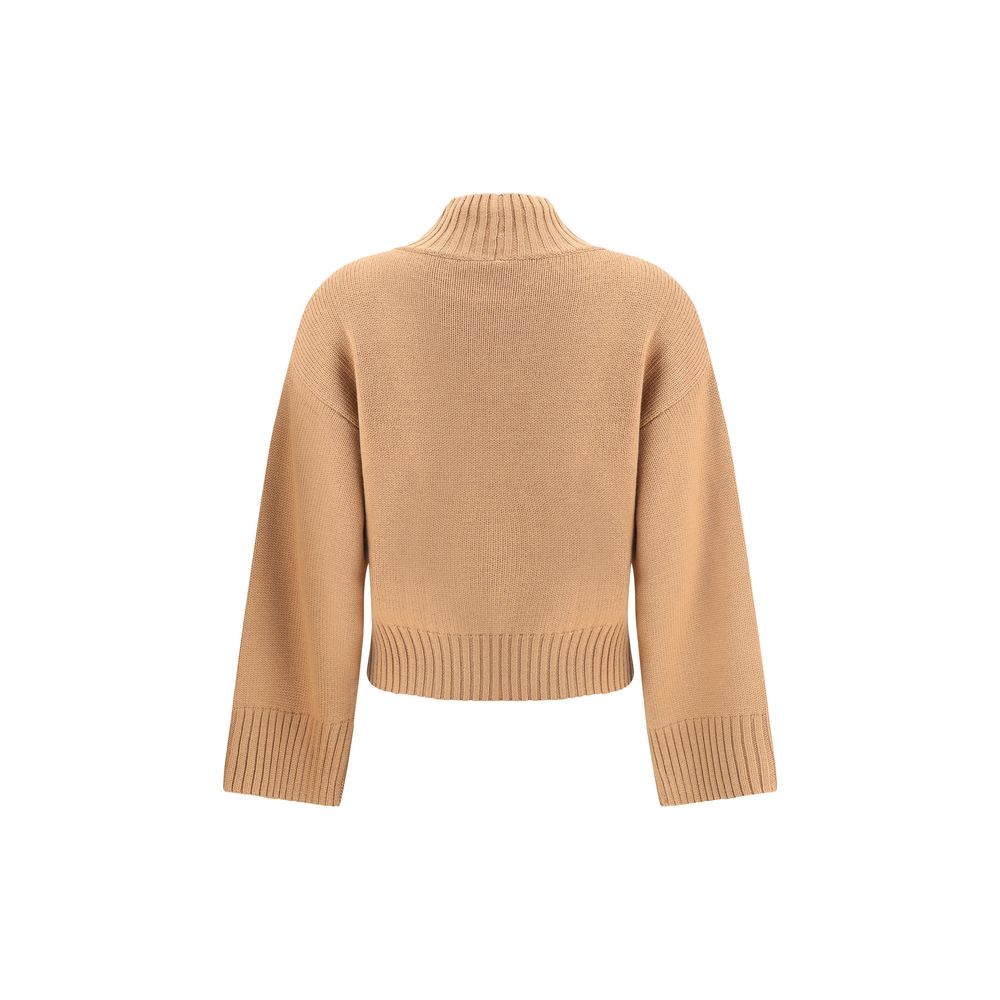 Back view of Fabiana Filippi beige wool turtleneck sweater showcasing ribbed detailing and long sleeves in a minimalist design.