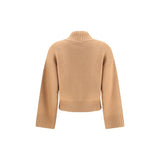 Back view of Fabiana Filippi beige wool turtleneck sweater showcasing ribbed detailing and long sleeves in a minimalist design.