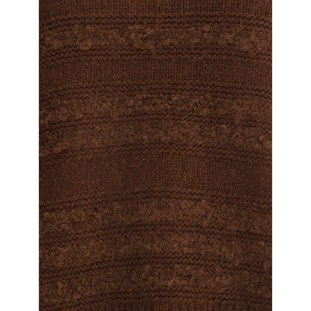 Close-up of Fabiana Filippi Camel Sweater fabric highlighting intricate knit detailing and premium wool texture in deep brown tone.
