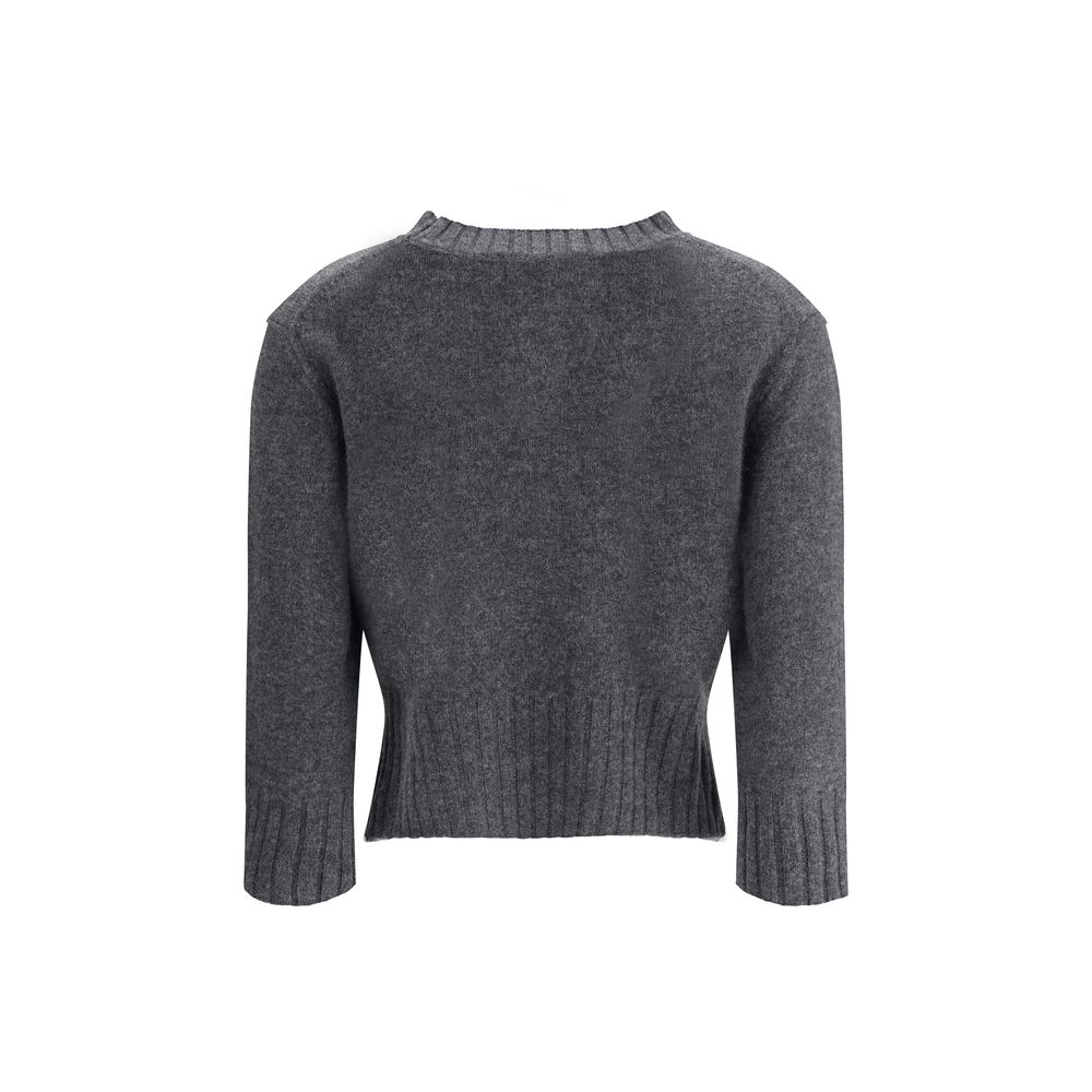 Back view of Loulou De Saison Cashmere Crop Sweater in gray, showcasing ribbed detailing and cropped silhouette for a modern look.