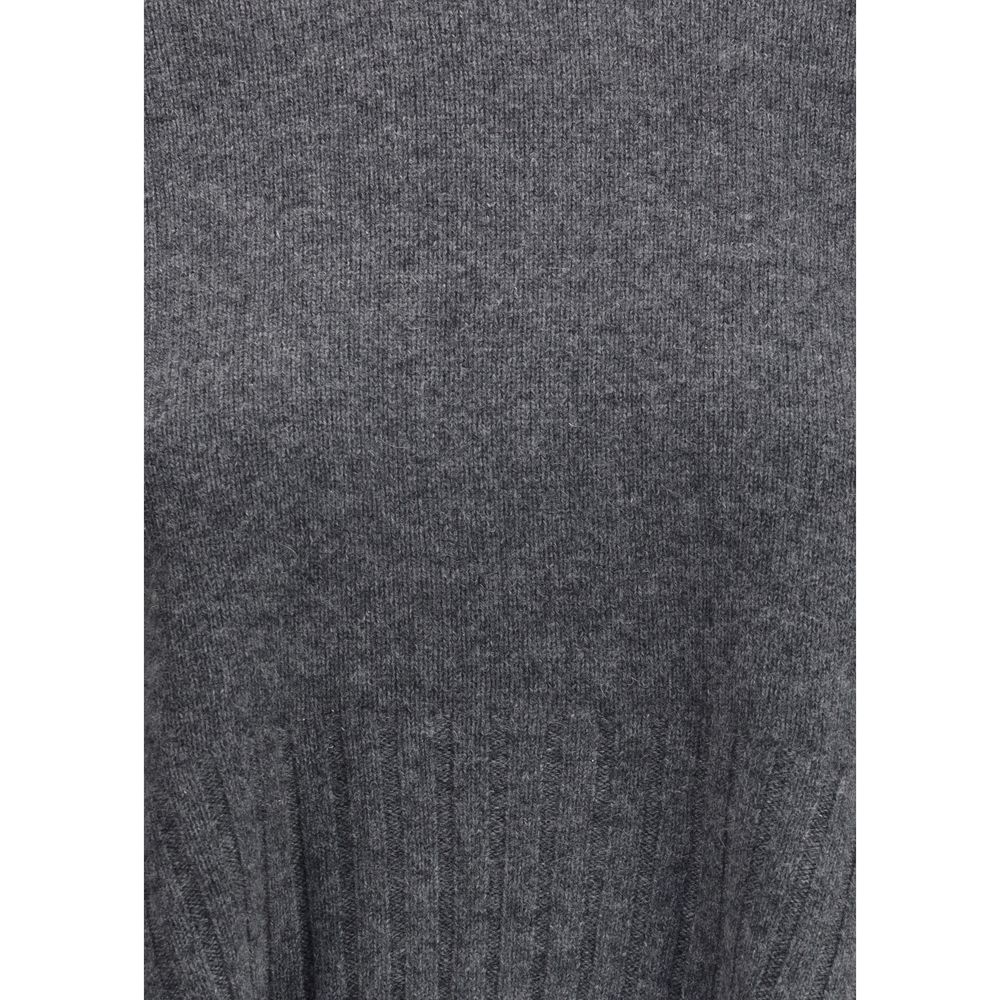 Close-up of Loulou De Saison Cashmere Crop Sweater fabric texture in gray, highlighting soft cashmere knit and ribbed pattern.