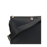 Close-up of Thom Browne Shoulder strap Pouch highlighting textured leather, adjustable strap, and tricolor tab for premium designer appeal.