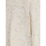 Close-up of Fabiana Filippi Buttoned fabric Pants highlighting the cream fabric's fine grid texture and abstract linear pattern.