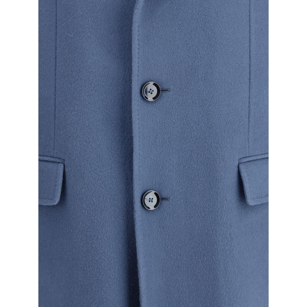 Close-up of Brioni Chesterfield Coat buttons and flap pocket detail, highlighting premium craftsmanship and elegant wool fabric texture.