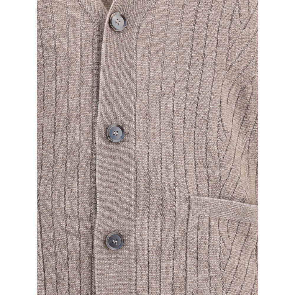 Close-up of Brioni Wool cardigan buttons and pocket, highlighting the fine ribbed knit and luxury wool fabric in brown for men's sweaters.