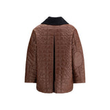 Back view of Ganni Shiny Quilt Midi Jacket showing quilted pattern, elbow patches, and pleated detail. Stylish and functional women's jacket.