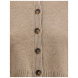 Close-up of Loulou De Saison Cashmere crop Cardigan buttons and ribbed detailing, highlighting premium knitwear craftsmanship.