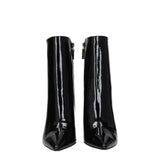 Front view of Stuart Weitzman Black Leather Ankle Boots showcasing sleek patent leather and pointed toe design for elegant women's shoe styling.