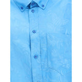 Close-up of Balenciaga Cocoon Shirt highlighting the textured floral pattern, chest pocket, and button details in premium blue fabric.