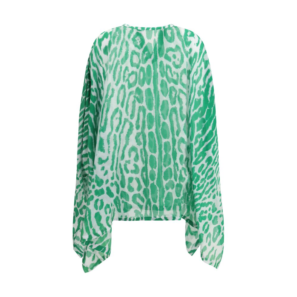 Back view of Tom Ford Kaftan Dress showcasing flowing long sleeves and green patterned fabric, perfect for stylish casual outfits.