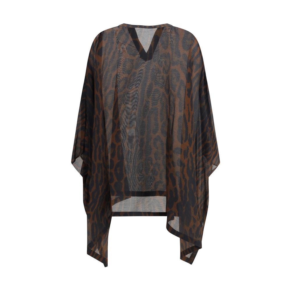 Back view of Tom Ford Kaftan Dress showcasing lightweight sheer material and flowing silhouette with leopard-inspired pattern.