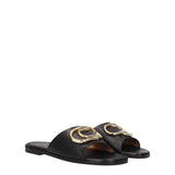 Pair of Off-White Black Leather Slippers Sandals with signature gold embellishments, ideal for women’s designer summer footwear collections.