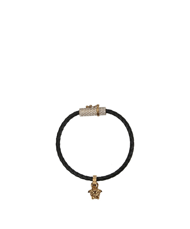 Versace Black Leather Bracelet featuring braided leather band with gold Medusa charm and crystal-embellished clasp. Luxury women's accessory.