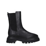 Stuart Weitzman Black Leather Ankle Boots with chunky lug sole and elastic side panels, ideal for women's fall and winter fashion.