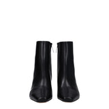 Front view of Off-White Black Leather Ankle Boots showcasing minimalist design and smooth leather finish for modern women's shoe trends.