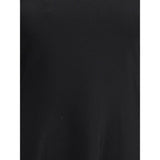 Close-up fabric detail of Valentino Knit Dress with volants in black, highlighting the fine knit texture and premium material quality.