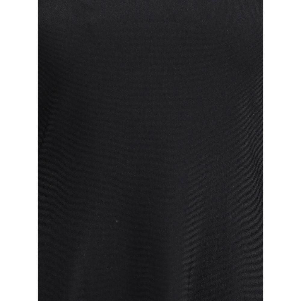 Close-up fabric detail of Valentino Knit Dress with volants in black, highlighting the fine knit texture and premium material quality.