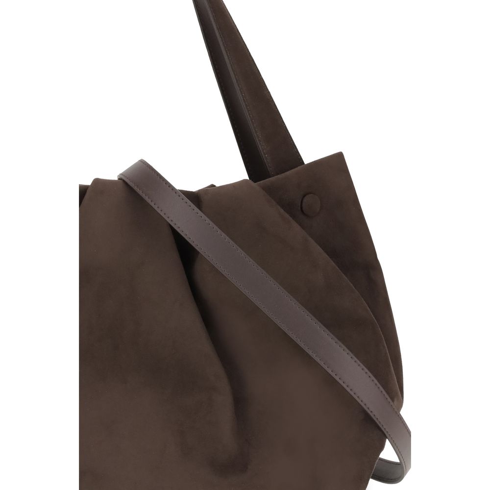 Close-up of THEMOIRè Athena Shoulder Bag detailing the smooth brown suede finish and sturdy leather strap for premium women’s bag collection.