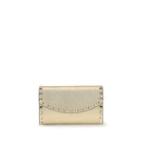 Front view of Valentino Garavani Rockstud chain Wallet in metallic gold leather with signature pyramid stud detailing, ideal for women’s accessories.