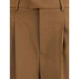 Close-up of Ami Paris High-waist trousers showcasing fine brown fabric texture and front pleat detailing for a refined finish.