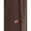 New Balance Elastic-waistband logo-patch track Pants