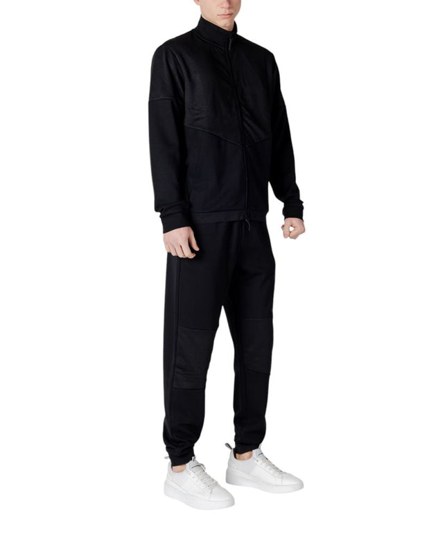 EA7 Emporio Armani Black Cotton Sweatsuit in a relaxed fit with ribbed cuffs and minimalist design, perfect for men’s sportswear fashion.