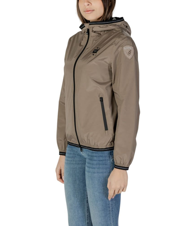Blauer green polyamide hooded jacket for women, side angle view highlighting zip pockets and logo patch on sleeve.