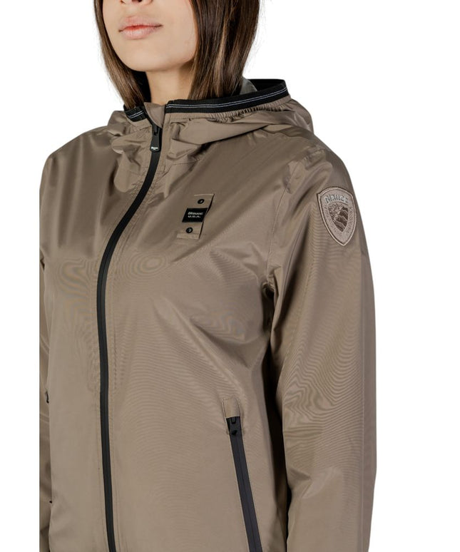 Close-up of Blauer green polyamide women's jacket showing chest logo and sleeve patch, designed for stylish outdoor wear.