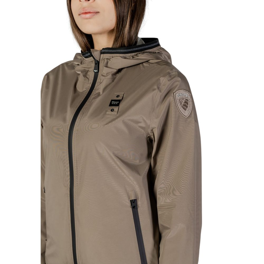 Close-up of Blauer green polyamide women's jacket showing chest logo and sleeve patch, designed for stylish outdoor wear.