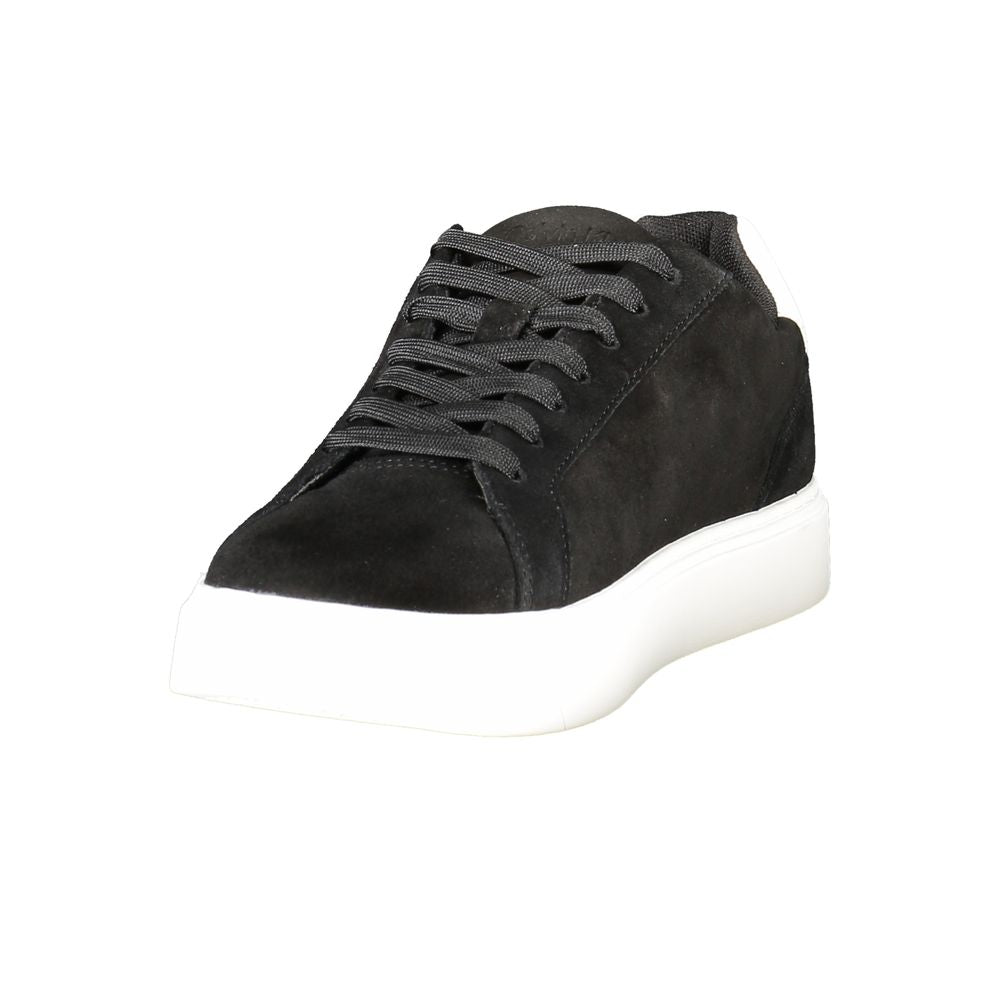 Side front view of Calvin Klein Black Leather Men Sneaker showcasing minimalist black upper and thick white outsole for everyday wear.