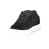 Side front view of Calvin Klein Black Leather Men Sneaker showcasing minimalist black upper and thick white outsole for everyday wear.