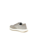 Rear view of Prada Prax 01 re-nylon sneakers in gray showing heel detail, padded collar, and embossed Prada branding on the sole.