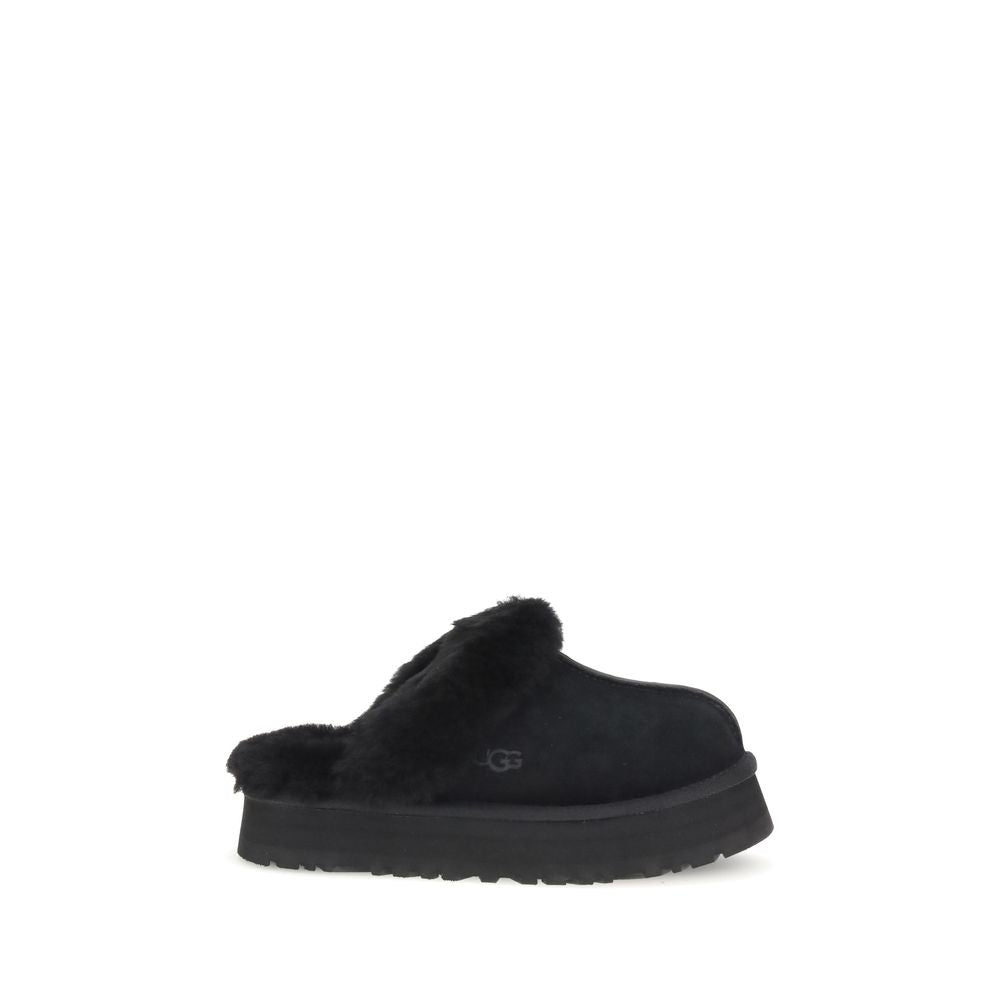 UGG Disquette Slides in black suede with plush shearling trim, EU36/US6 size, side profile view for women’s flats category.