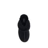 Top view of UGG Disquette Slides in black, highlighting the plush shearling interior and rounded toe design for women’s flats.