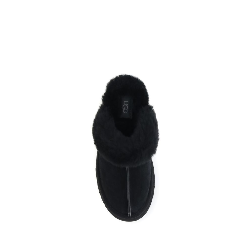 Top view of UGG Disquette Slides in black, highlighting the plush shearling interior and rounded toe design for women’s flats.