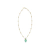 Chloé Elixir Pendant Necklace with a delicate gold chain and green elixir-shaped pendant, perfect for upscale jewellery collections.