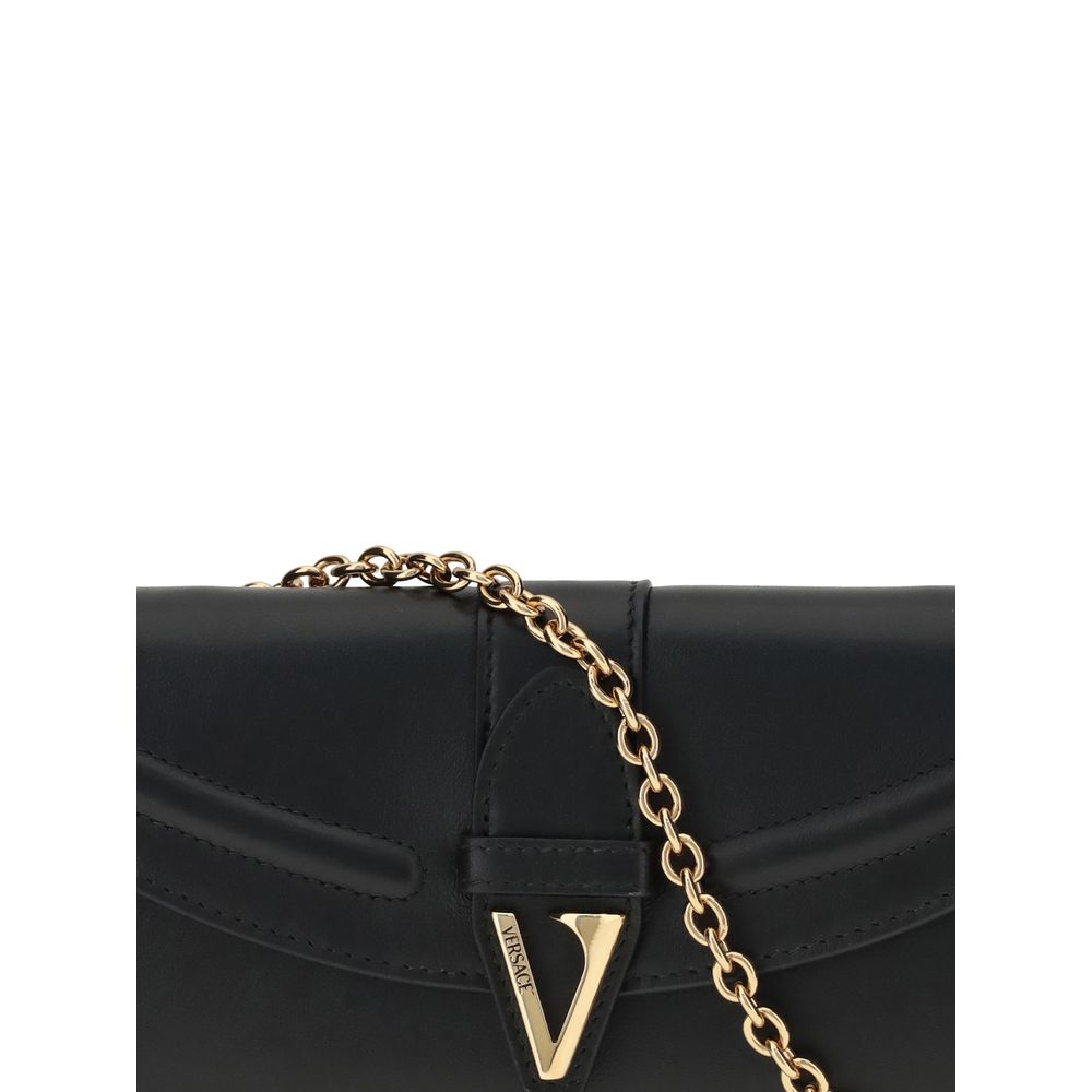 Close-up of Versace Chain Wallet with gold chain strap and signature V-logo clasp, highlighting premium craftsmanship and designer detail.
