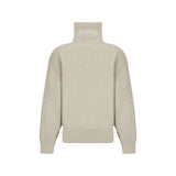 Back view of Marant Etoile Axelle Cotton Cardigan in beige, showcasing relaxed fit, ribbed hem, and long sleeves. Ideal for layering in cool weather.